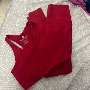 Red two-piece athletic set.